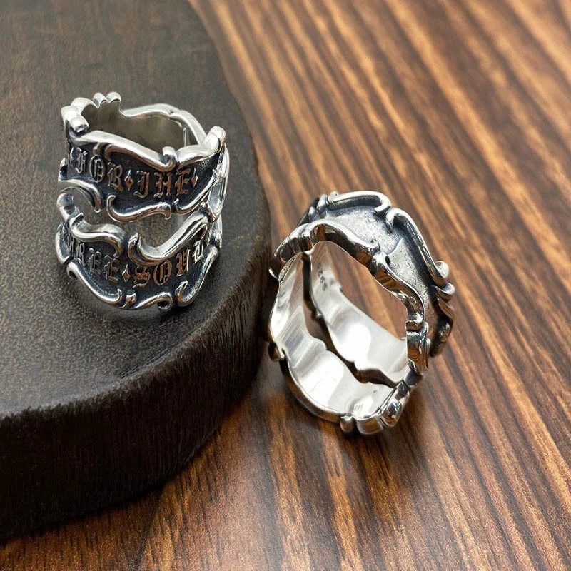 A personalized retro-style sterling silver ring with a ribbon design, made for men's fashion and accessory needs.