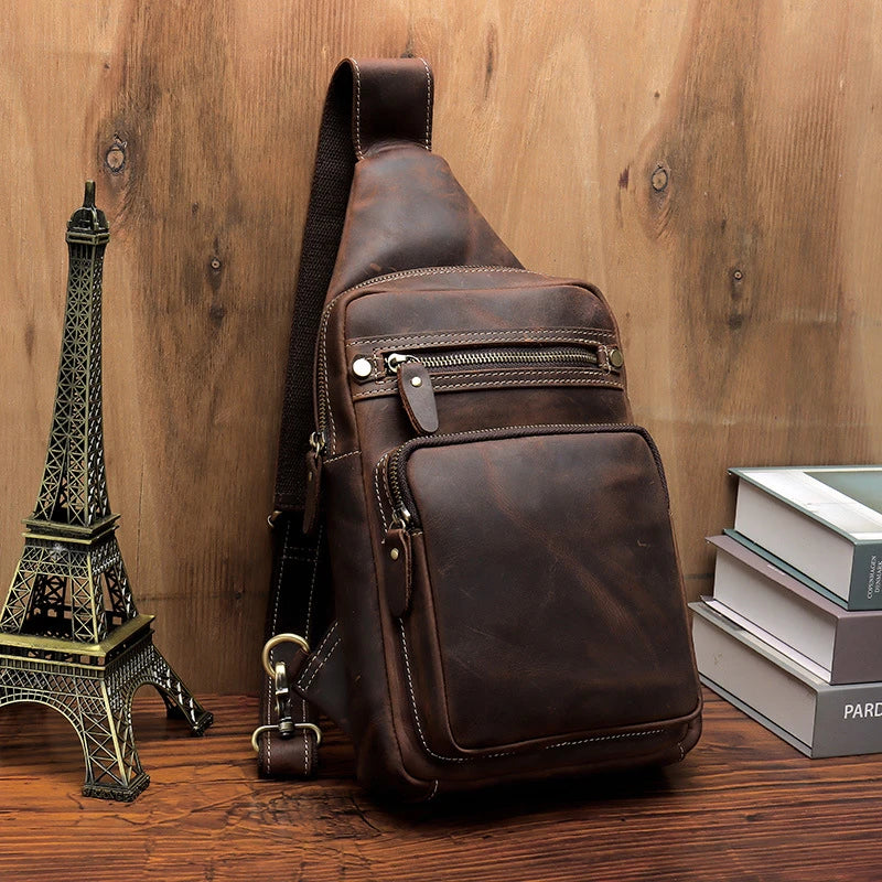 Vintage-inspired genuine leather briefcase with multiple compartments and secure zipper closure, ideal for modern commuters