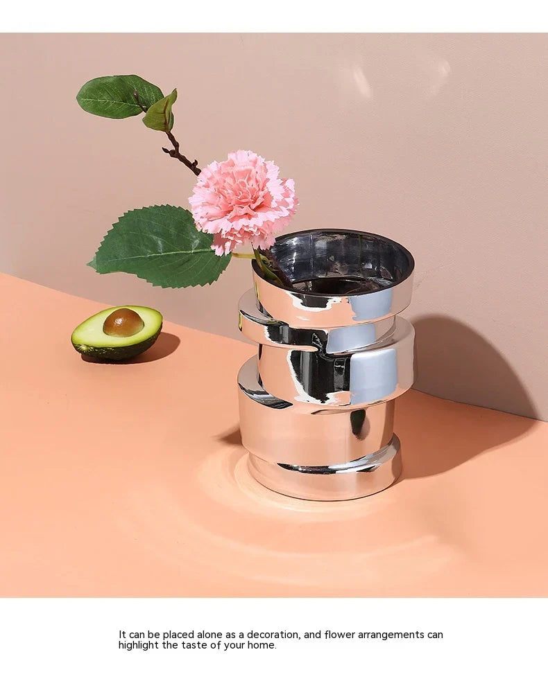Electroplated silver glass vase with a modern, geometric design for home decor