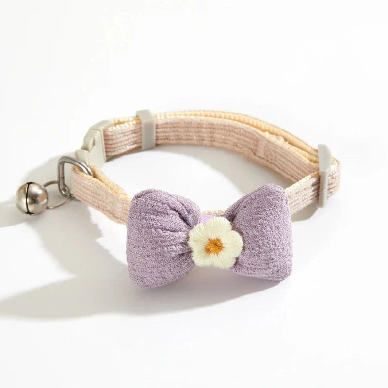 Stylish checkered pet collar with elegant butterfly knot decoration, perfect for dressing up cats and dogs