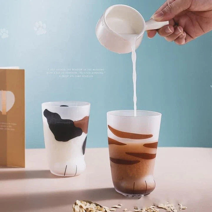 Charming cat paw shaped glass mug with a generous 301-400 ml capacity, perfect for enjoying your favourite hot beverage