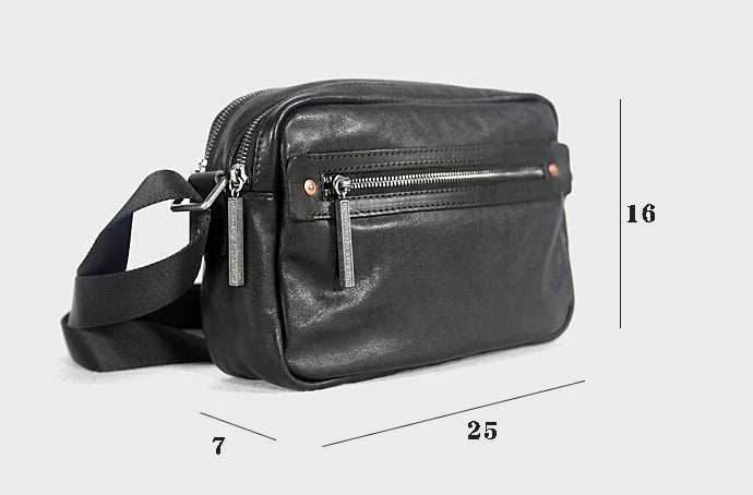 A premium British leather shoulder bag with a sleek, minimalist design and adjustable strap