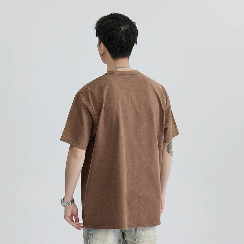 Premium vintage-inspired short-sleeved t-shirt in a distressed black colour, made of soft pure cotton fabric