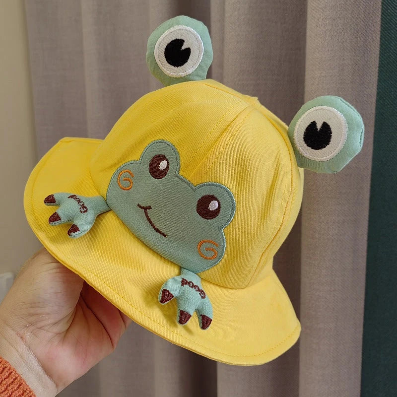 Charming frog-themed baby sun hat made from soft, breathable cotton with UPF 50+ sun protection