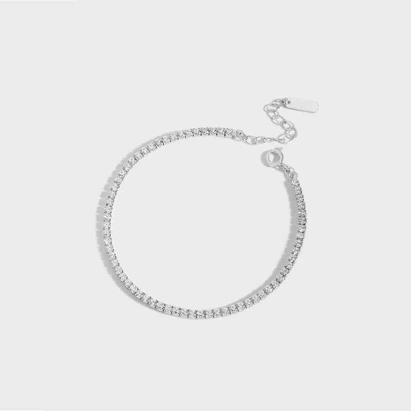 Sparkling silver geometric bracelet with adjustable clasp and intricate patterns