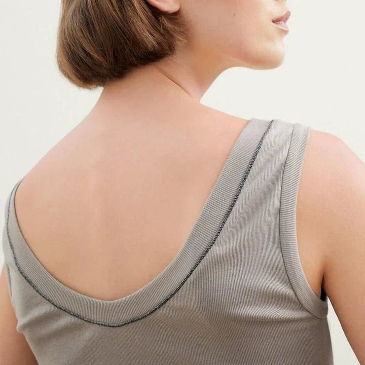 100% wool sleeveless knit vest with delicate beading, available in white colour and multiple sizes