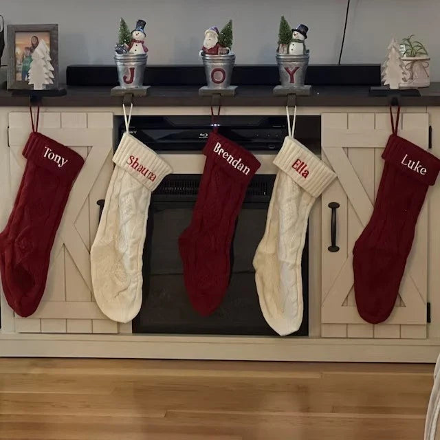 Premium hand-embroidered Christmas socks in a variety of festive colours, featuring intricate machine embroidery for a touch of traditional British charm.