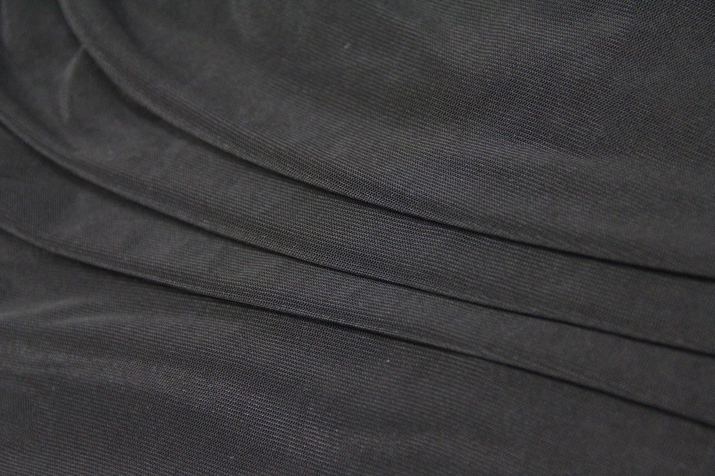 Elegant puff sleeve mesh dress with a flattering short, irregular skirt in white and black colours