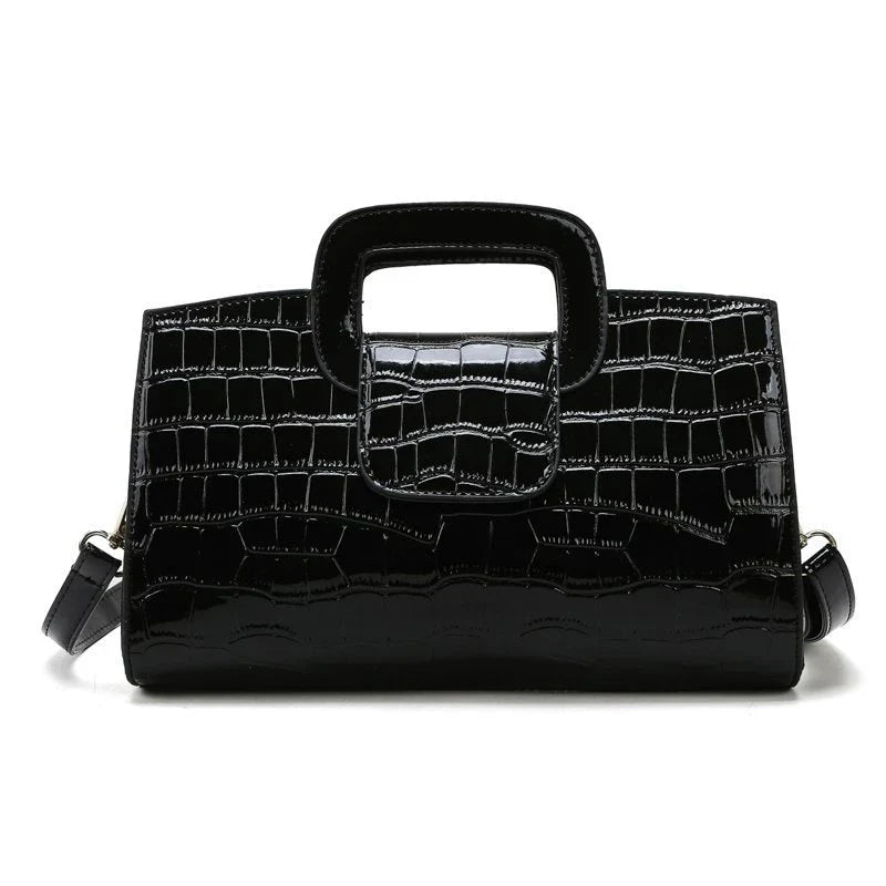 A stylish and versatile retro-patterned handbag with a sturdy canvas construction and organised interior, perfect for everyday use in the UK.