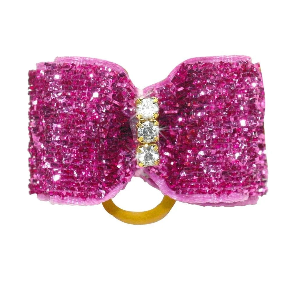 Glittery hair bows for dogs in various quantities, made with premium nylon for long-lasting durability and a sparkling finish.