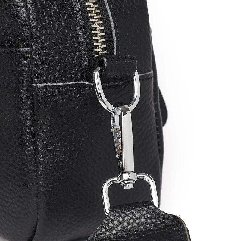Stylish leather crossbody bag with embroidered strap in various colours
