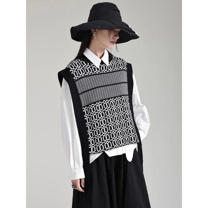Women's black sleeveless vest with irregular knitting pattern, a versatile and stylish layering piece for the modern British woman