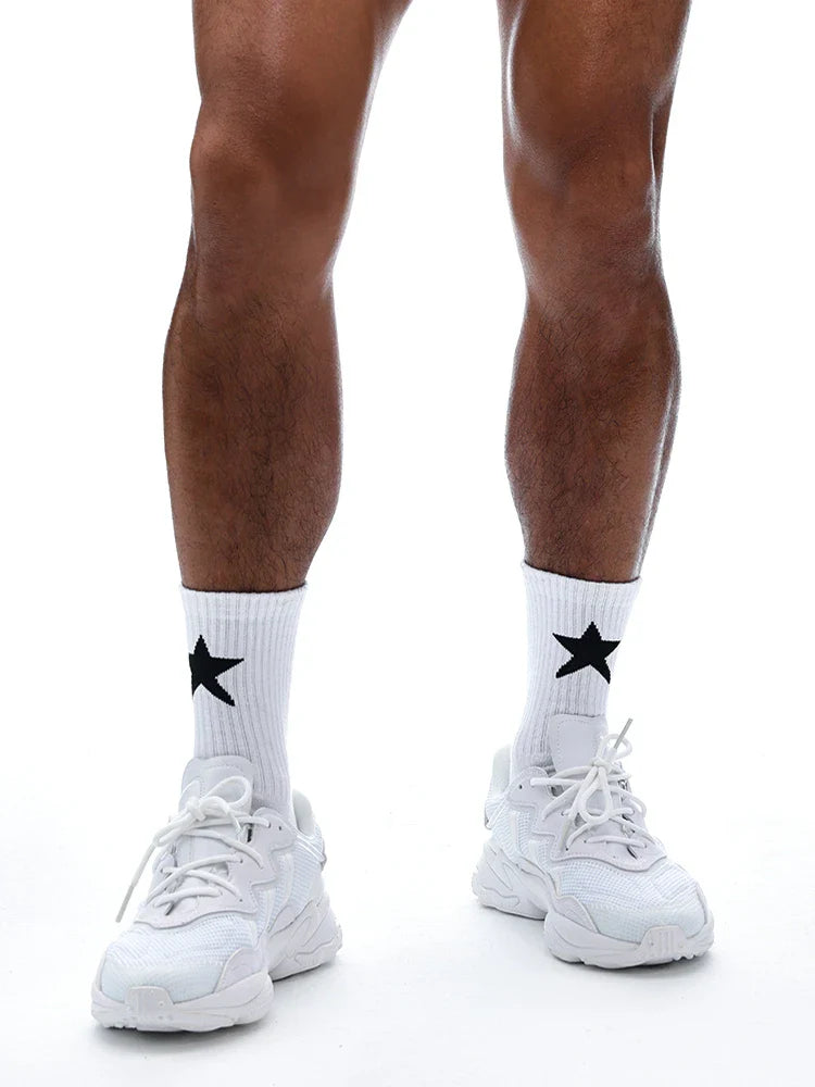 Premium white sports socks with a five-pointed star pattern, designed for men's active lifestyles.