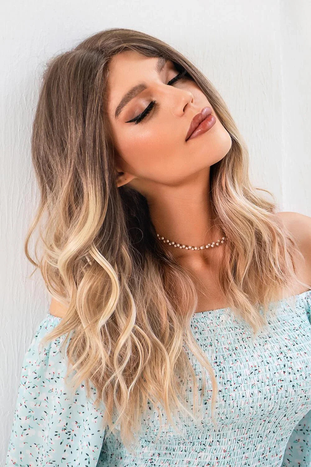 Luxurious 13x2 inch lace front wig with 24-inch waves in a natural-looking ombre colour
