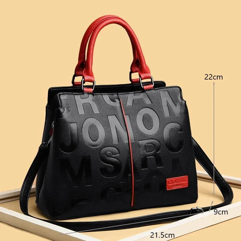 Sophisticated large leather tote bag with embossed lettering design, suitable for daily use and travel