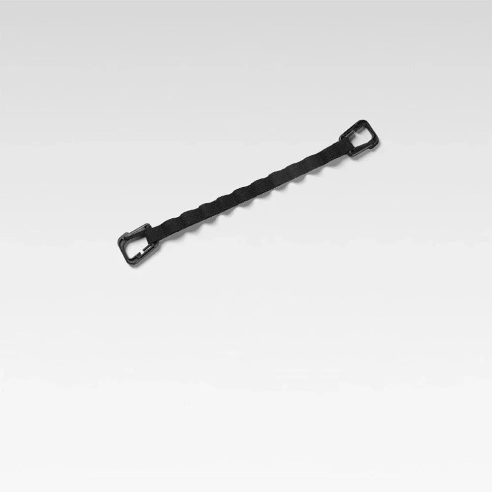 Adjustable camping strap with multi-ring design for organising outdoor gear and supplies