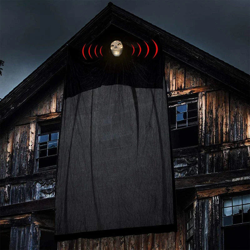 Voice-activated Halloween decoration with ghost-shaped design, lighting, and sound effects