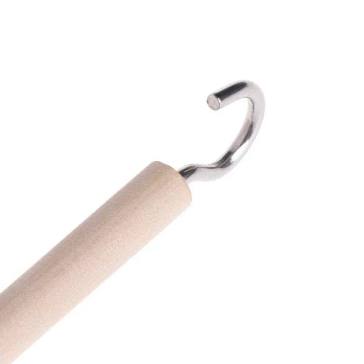 A natural wooden swing with a bell, designed as a perch and toy for parrots to enjoy in their cage or aviary.