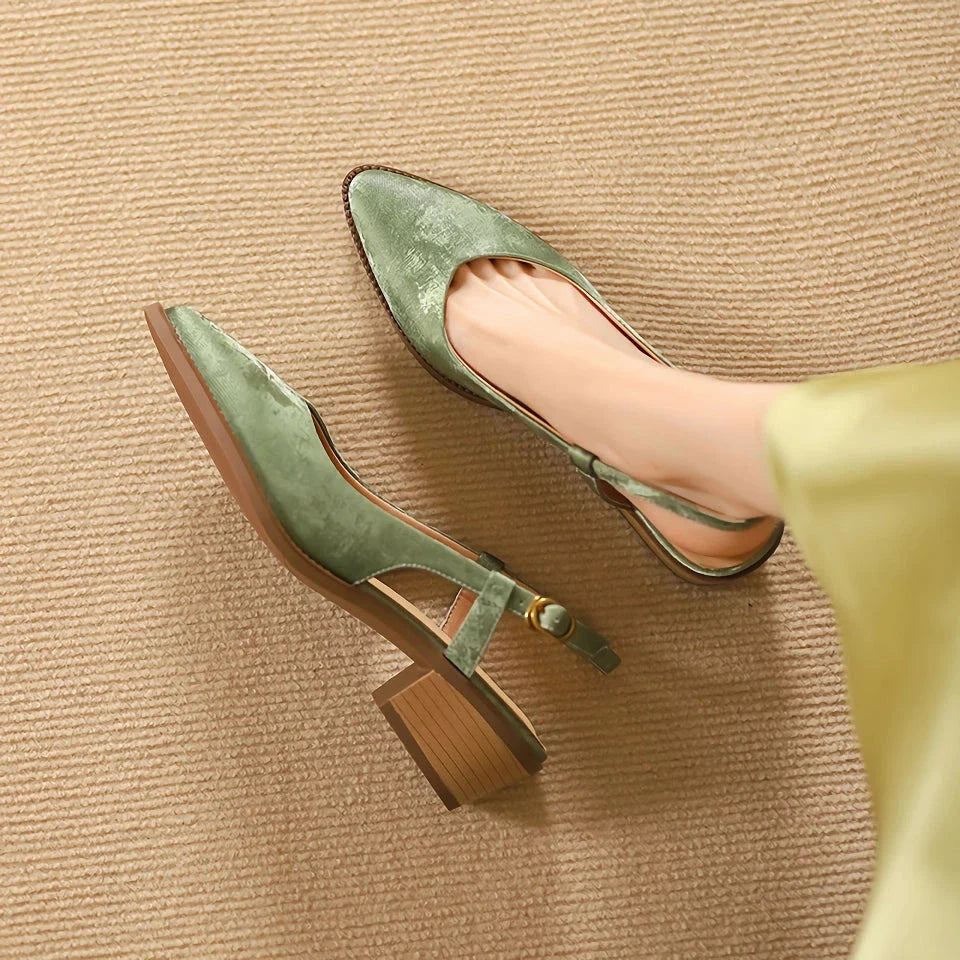 Elegant slingback leather pumps with a stylish mule design, secure buckle closure, and 4cm square heel