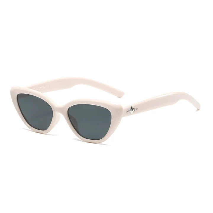 Classic cat-eye sunglasses with rice nail detail, offering UV protection and gradient lenses for a timeless, sophisticated look.