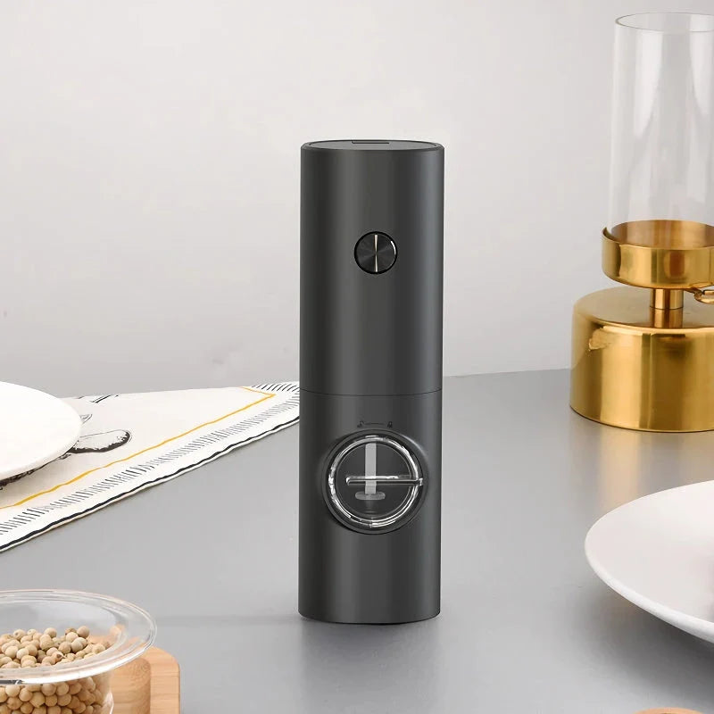 Premium compact electric spice grinder with adjustable coarseness settings, automatic operation, and durable construction for home and travel use