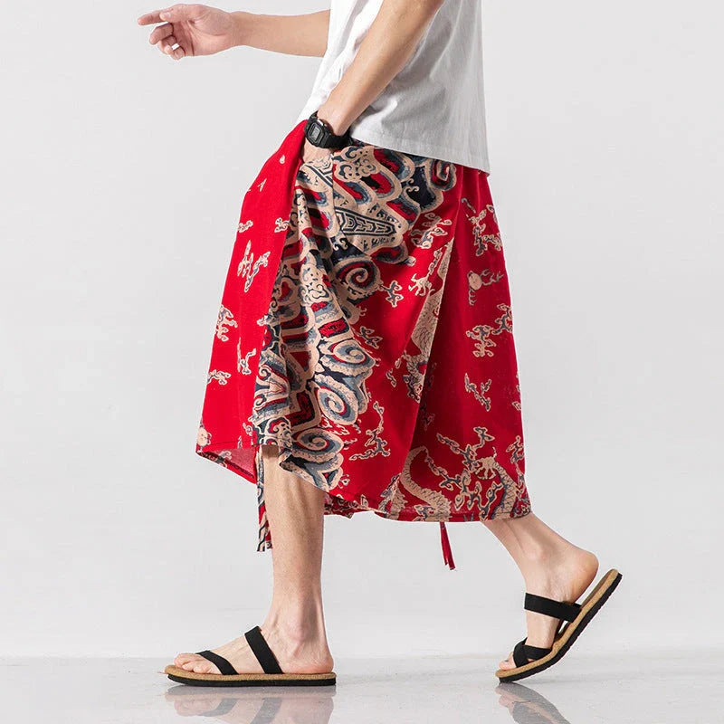 Men's loose-fitting Chinese-inspired cropped pants with a dragon or elephant floral pattern in navy blue, red, or coffee colours