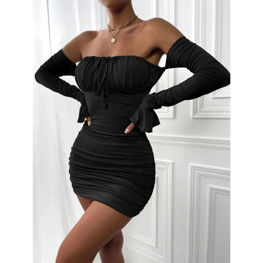 A green off-shoulder lace-up bodycon mini dress with trumpet sleeves and a backless design.