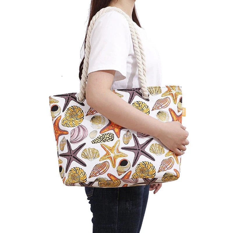 Stylish canvas beach tote bag with Shells Conch print design, perfect for summer adventures