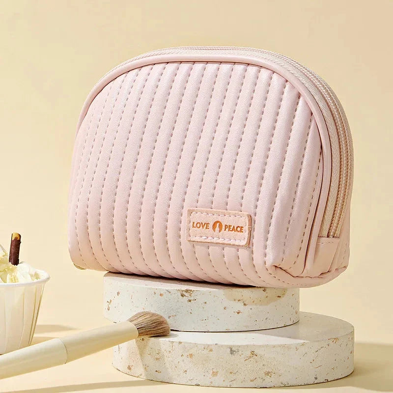 Compact Shell Cosmetic Bag for Women - A stylish and functional makeup pouch for the modern British woman