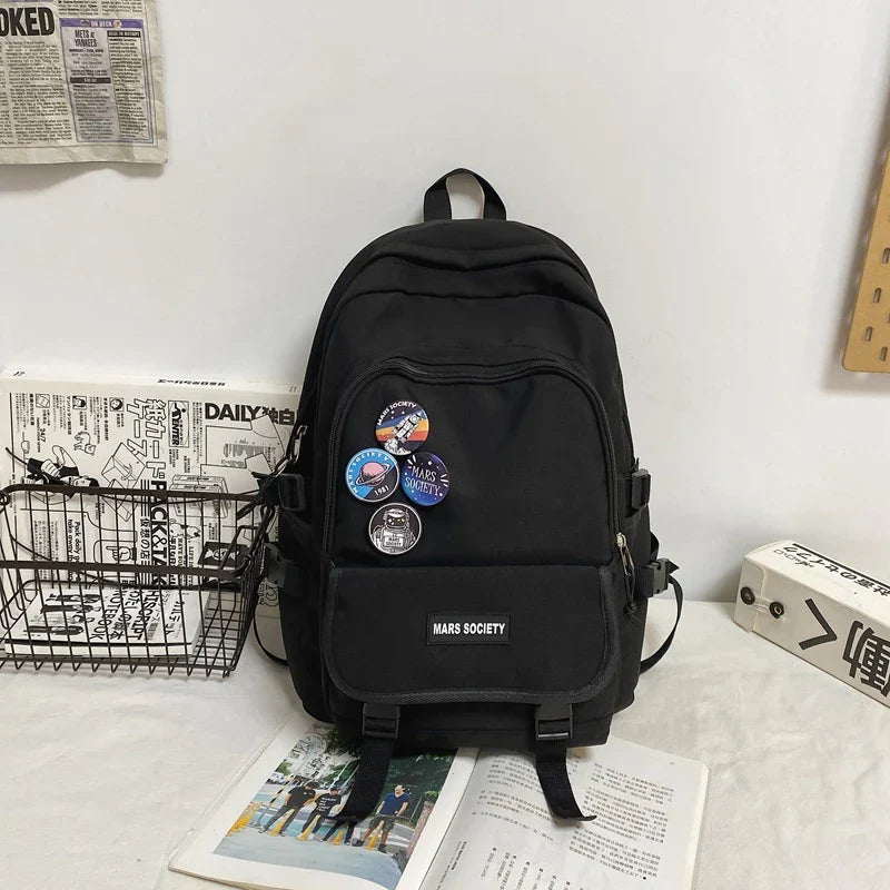Stylish college and school backpack with ample storage capacity, durable nylon construction, and modern design features