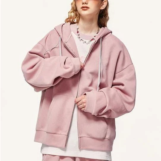 A premium British cotton and polyester hoodie jacket with a zip-up design, featuring a relaxed, oversized fit for everyday comfort and style.