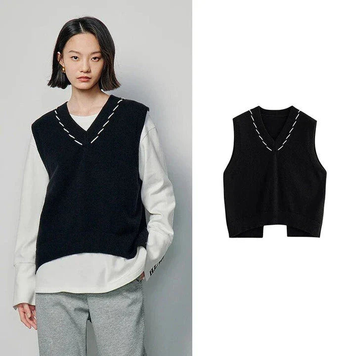 Elegant sleeveless v-neck knit vest in rose red and black colours, with a stylish split back design for a flattering silhouette