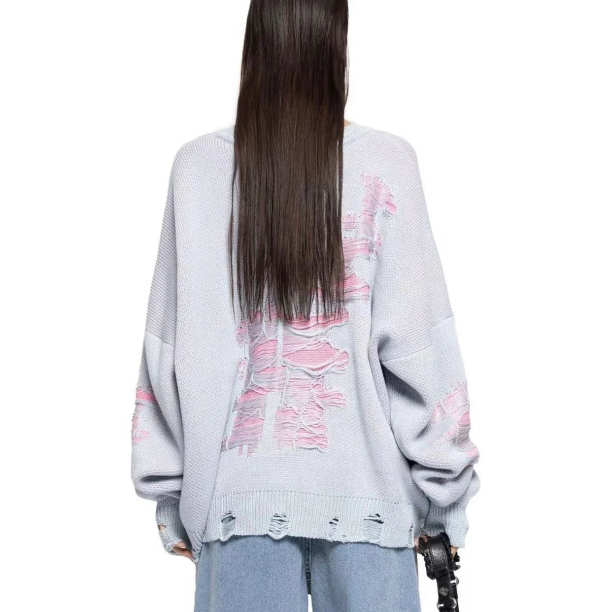 A stylish ripped long sleeve top in a variety of versatile colours, including grey, green, and black.