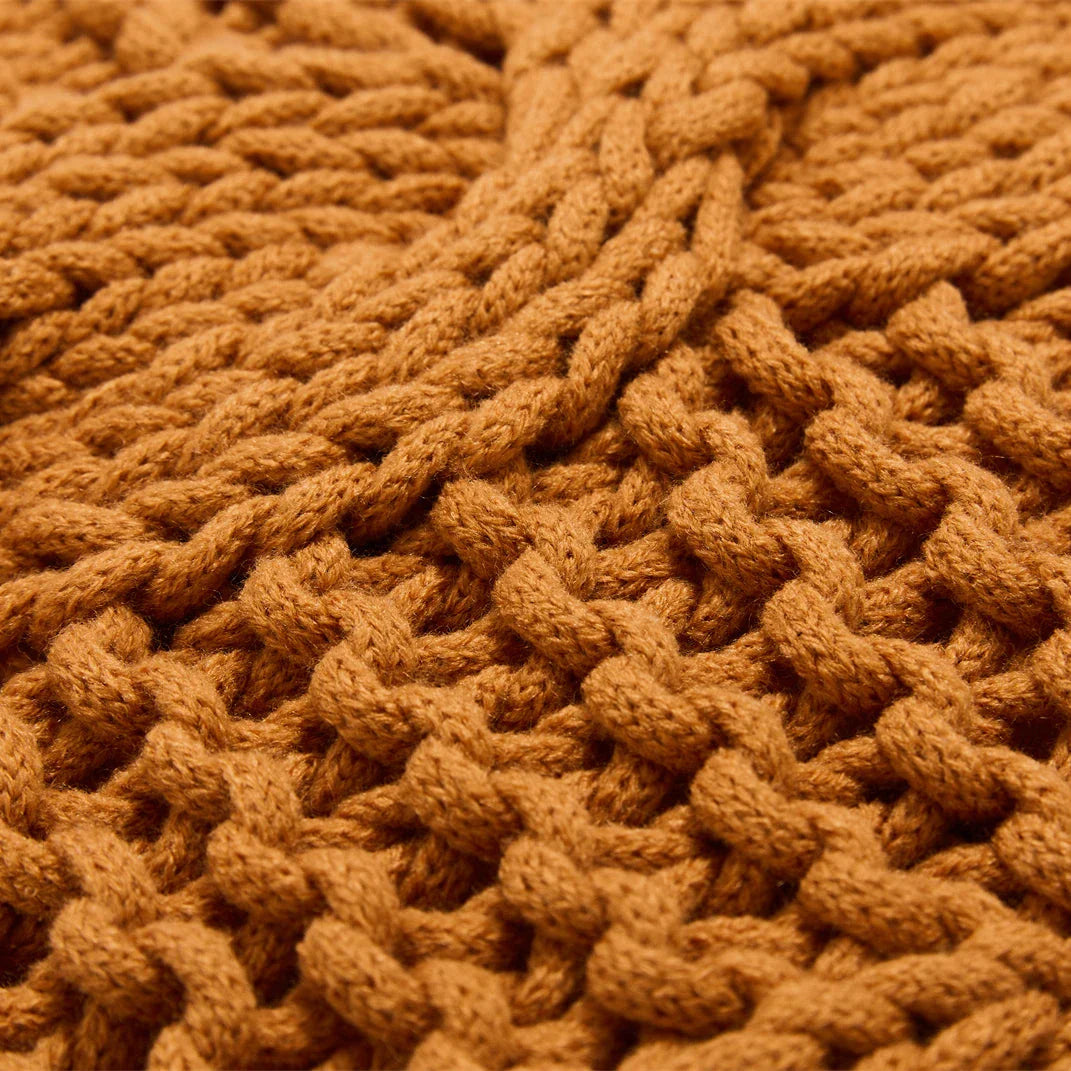 Luxurious hand-crocheted chunky knit throw pillow in a range of vibrant colours, providing cosy comfort and sophisticated style.