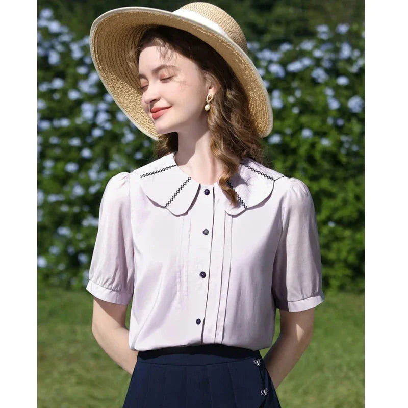 Elegant French puff sleeve blouse with timeless Peter Pan collar, available in purple and various sizes