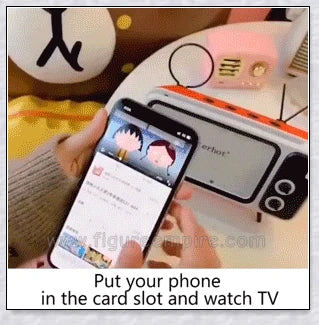 Retro TV-inspired phone stand with built-in Bluetooth speaker for hands-free entertainment and music playback