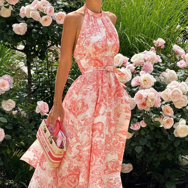 Sophisticated and versatile mid-length backless dress in a vibrant pink hue, featuring an A-line silhouette and convenient side pockets.