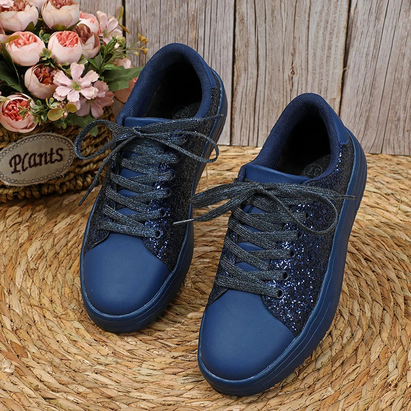 Glittering sequin flats with thick soles and lace-up closure in various vibrant colours