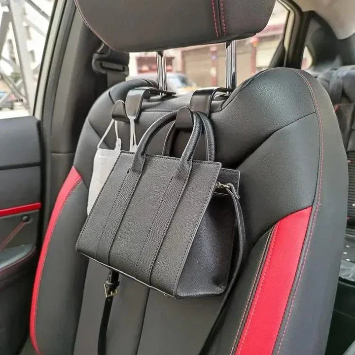 Premium 4-pack car seat headrest hooks in black, designed to organise and declutter UK drivers' vehicles