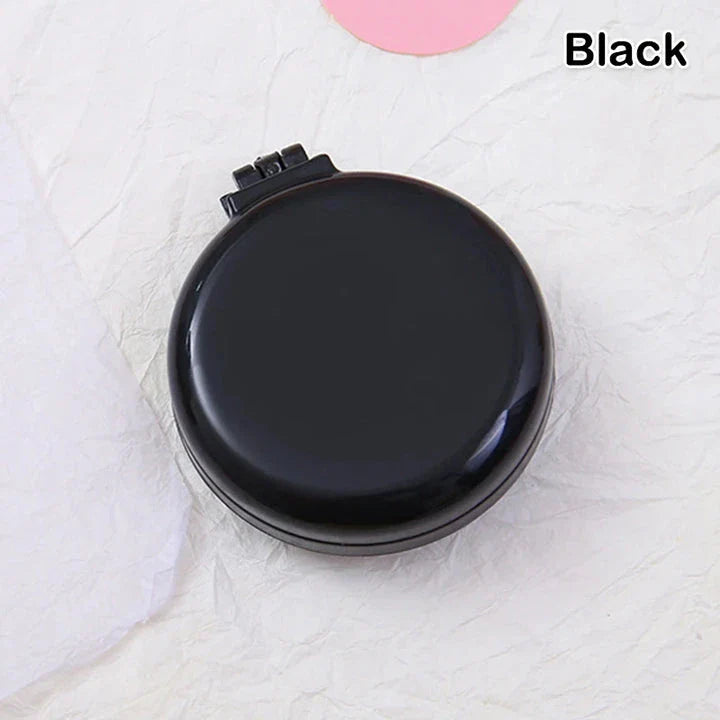 Compact folding hair comb with mirror, perfect for on-the-go touch-ups and styling for British customers