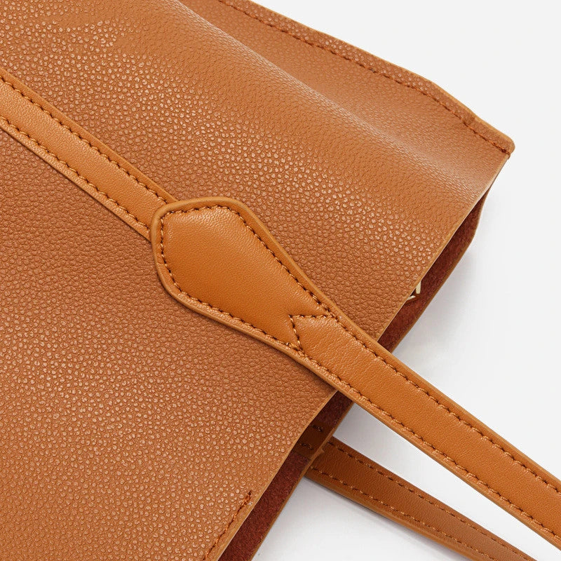 Premium cowhide leather shoulder bag with multiple compartments and adjustable strap for versatile everyday use