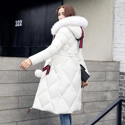 A premium padded down coat for women with a detachable hood, designed to provide warmth and style during the winter.
