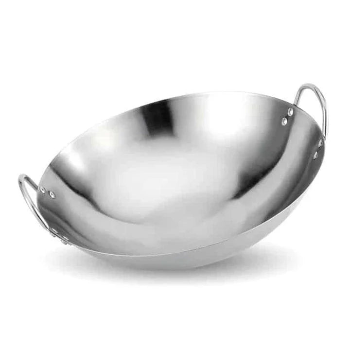 Premium British-made cast iron wok pan with superior heat retention and even heat distribution for versatile cooking