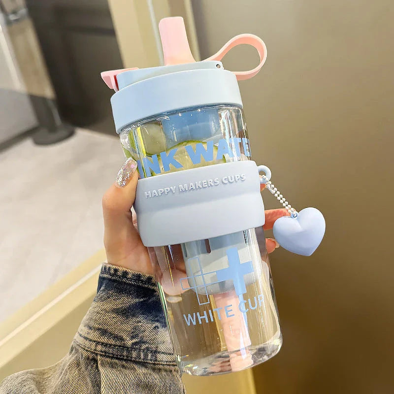 27oz water bottle with straw filter cover in pink, green, and blue colours for stylish hydration on the go