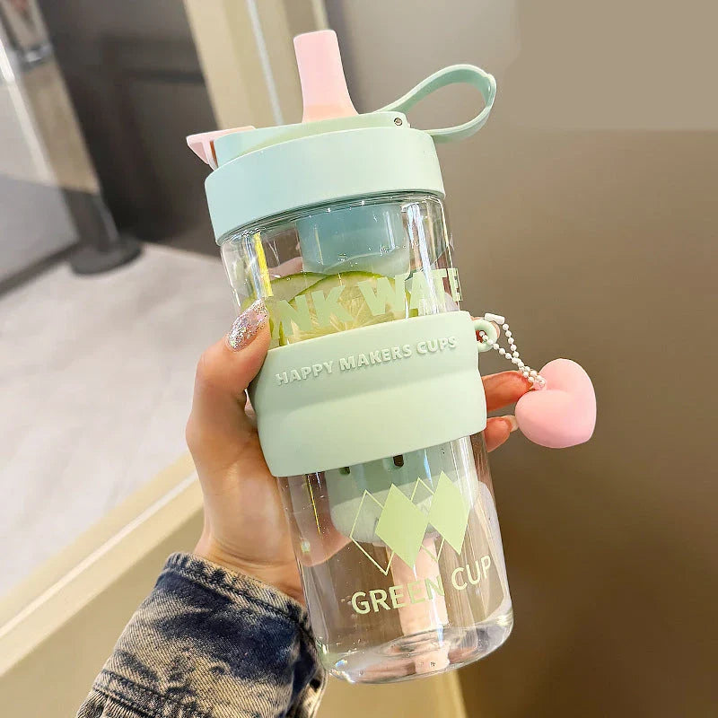 27oz water bottle with straw filter cover in pink, green, and blue colours for stylish hydration on the go