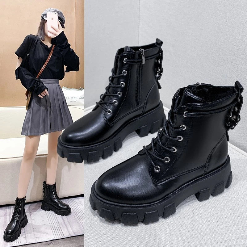 Stylish women's leather boots with a handsome locomotive design, durable rubber soles, and a comfortable round toe for autumn and winter wear.