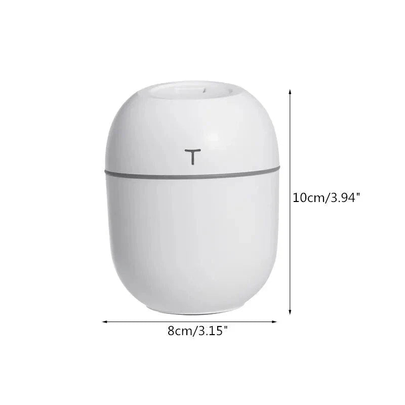 Compact ultrasonic humidifier and aroma diffuser with LED night lamp, available in white colour