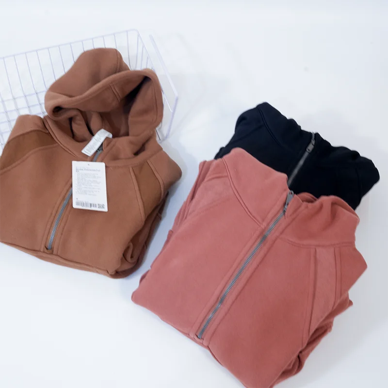 Premium women's sports fleece hoodie with half zip, available in a range of sophisticated colours