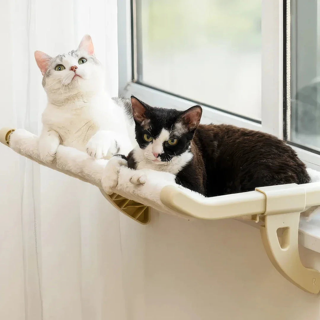 A stylish and durable cat hammock bed that attaches securely to any window, providing your feline friend with a cosy and elevated spot to relax.