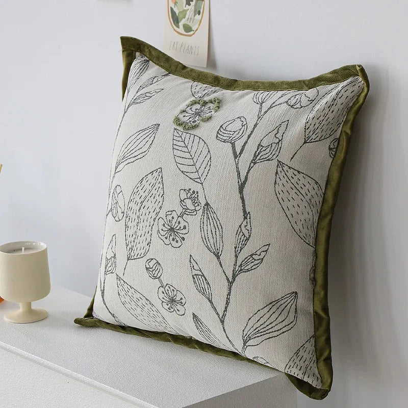 Luxurious cream and green jacquard cushion cover with a unique pattern, measuring 45 x 45 cm for a generous size and impactful presence.